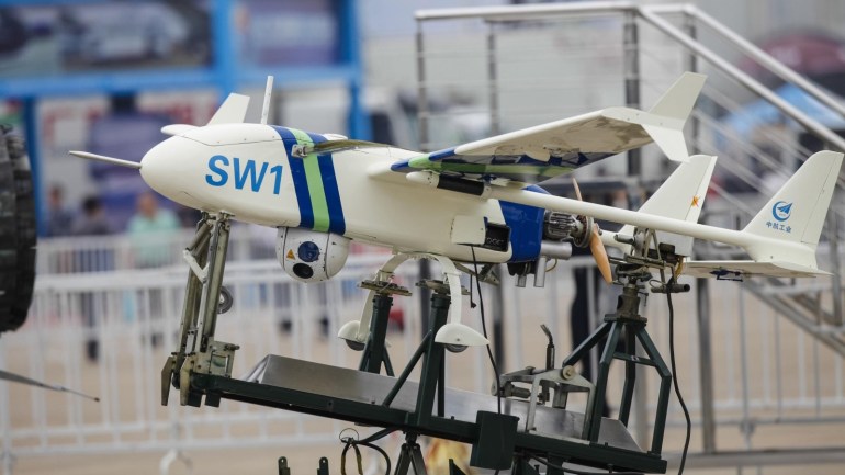 ZHUHAI, CHINA - NOVEMBER 10: Chinese drone aircrafts is displayed at the Airshow China 2014 in Zhuhai, Guangdong province, November 10, 2014. Airshow China is the only international aerospace trade show in China that is endorsed by the Chinese central government since 1996. It features the display of real-size products, trade talks, technological exchange and flying display. 