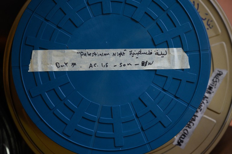 This photograph shows a reel of Palestinian film, part of a collection of 40 Palestinian films made between 1960 and 1980, is displayed at the Conservation and Research Center of the Toulouse Cinematheque, in Toulouse, southwestern France, on August 1, 2024. - In the early 1980s, the Palestinian Film Institute in Beirut, where around a hundred militant films were stored, was bombed by Israel during the Lebanon war. Its director, Khadijeh Habashneh, fled the country, leaving the reels behind. Almost 40 years later, the 79-year-old former director of the Institute has managed to collect 40 short and medium-length films, in 16 and 30 mm formats, which will be shown to the general public at the Cine Palestine festival in Toulouse. (Photo by Ed JONES / AFP)