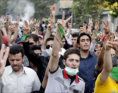 Supporters of opposition leader Mirhossein Mousavi march in north Tehran July 30, 2009. Baton-wielding Iranian police fired tear gas on Thursday and arrested protesters