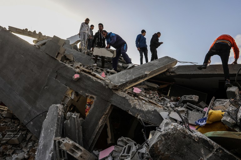 03 March 2024, Palestinian Territories, Rafah: Palestinians search for missing people under the rubble after an Israeli air strike on a house belonging to the Abu Anza family. Photo: Abed Rahim Khatib/dpa (Photo by Abed Rahim Khatib/picture alliance via Getty Images)