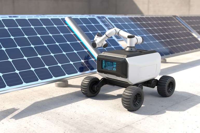 Robot clean solar panels, Automatic robot cleaning solar cell. 3D illustration; Shutterstock ID 2446716611; purchase_order: aljazeera ; job: ; client: ; other: