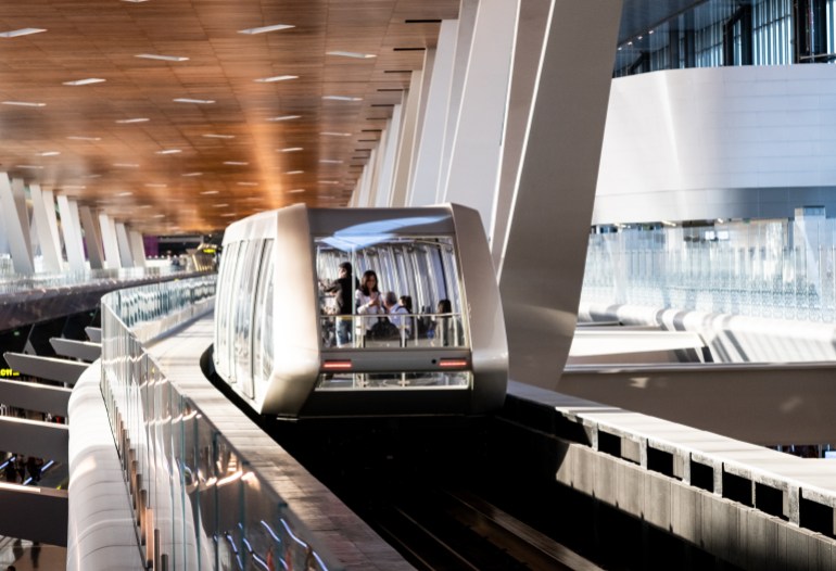 DOHA, QATAR - SEP 12, 2019: Automatic People Mover in Terminal 1 of Doha Hamad International Airport. The airport is opened in 2014 and is the hub of Qatar Airways