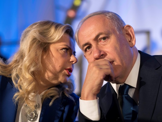 Israeli Prime Minister Benjamin Netanyahu and his wife Sarah Netanyahu attend an event marking the 50th anniversary of Israel's capture of East Jerusalem during the 1967 Six-Day War, opposite the Old City wall and near the Tower of David in Jerusalem May 21, 2017. REUTERS/Abir Sultan/Pool