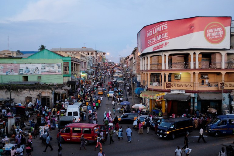 Adum market is seen at nightfall in Kumasi, Ghana, July 22, 2019. This central business district of Kumasi is the hub for trade that supplies the hinterlands and northern parts of Ghana with goods from the south. REUTERS/Francis Kokoroko SEARCH "SLAVERY JOURNEY" FOR THIS STORY. SEARCH "WIDER IMAGE" FOR ALL STORIES.