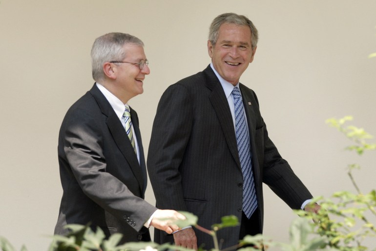 U.S. President George W. Bush (R) smiles as he walks with White House Chief of Staff Josh Bolten from the Oval Office in Washington before his departure to Kennebunkport, Maine August 9, 2007. REUTERS/Yuri Gripas (UNITED STATES)