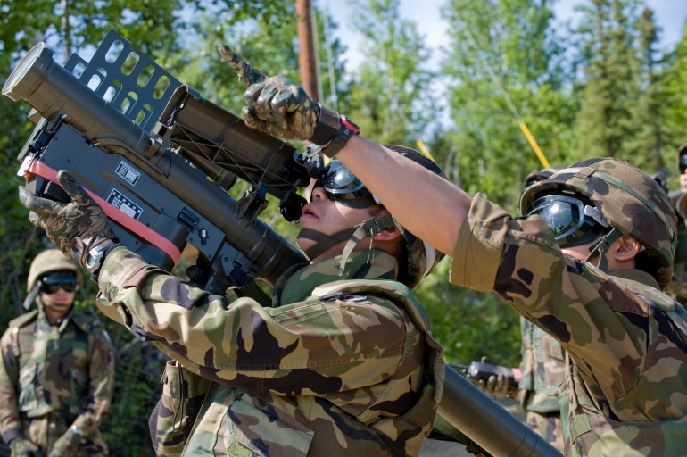 Staff Sgt. Masayuki Inomata operates a Type 91 Sam-2 Surface to Air missile launcher at enemy aircraft while his team mate Staff Sgt. Hiroshi Yamashita locates the target on the Pacific Alaskan Range Complex June 11, 2008 during RED FLAG-Alaska 08-3. During this exercise Japanese Forces are positioned in varies locations acting as a threat to blue forces aircraft. Both are missile operators assigned to the Japanese Air Self Defense Force. (U.S. Air Force Photo/Airman 1st Class Jonathan Snyder) (Released)