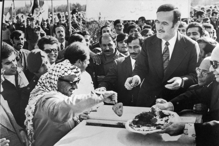 Yasser Arafat (1929-2004), Chairman of the Palestine Liberation Organisation (PLO) on left with President of Syria Hafez al-Assad (1930-2000) as they attend a public engagement in Damascus, Syria in 1978. (Photo by Terence Spencer/Popperfoto via Getty Images)